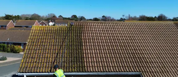 Roof cleaning a healthcare centre in Sussex