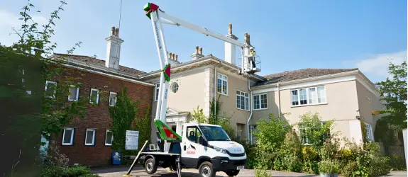 using our cherry picker on a commercial gutter cleaning job in Filwood, Sussex